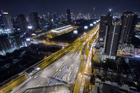 aerial view road traffic transportation and city in bangkok at night, top viewの写真素材
