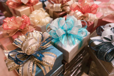 lot of Gift box and ribbon bow colorful background for celebration festival event new year partyの写真素材