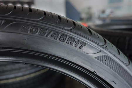 car tire size for sale represents the dimensions and construction type of tyre show on backgroundの写真素材