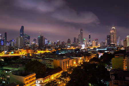 business cityscape area and modern building city and transportation urban area at dusk twilight night sky of bangkok thailandの写真素材
