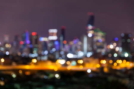 abstract defocused bokeh business cityscape area at night light sky backgroundの写真素材