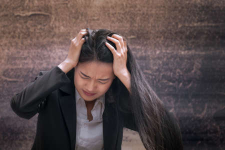 Asian business woman professional failed or upset in job or career for working business problem conceptの写真素材