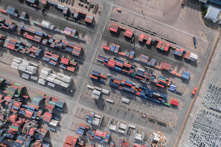 container cargo ship, import export, business logistic supply chain transportation concept for shipping aerial view 90 degree backgroundの写真素材