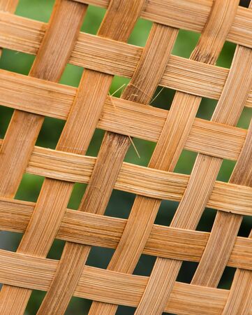 thai weave in dark green backgroundの写真素材