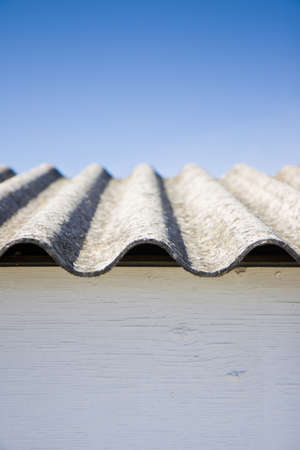 Asbestos roof in the blue skyの写真素材