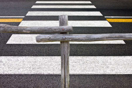 Wooden fence and pedestrian crossing  Concept image 