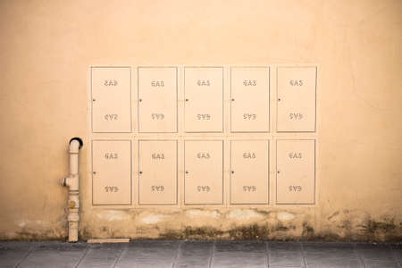 Protective metal Box of gas meter in a condominium buildingの写真素材