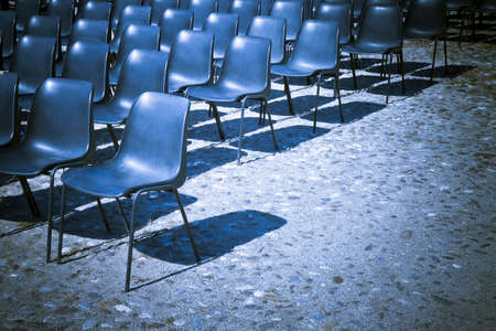 Chairs of an outdoor cinema - toned imageの写真素材