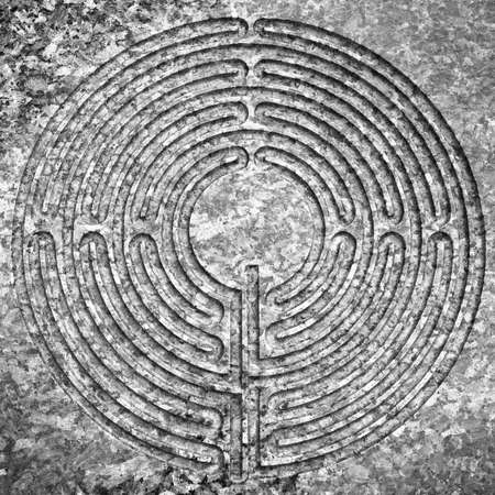Labyrinth carved on stone - concept imageの写真素材