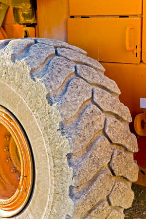 Detail of the excavator's wheel with copy space