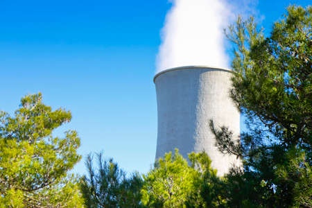 Geothermal power plant in Tuscany hills with copy spaceの写真素材