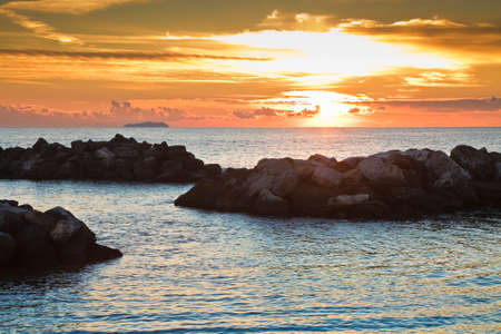 Sunset in the Mediterranean Sea (Tuscany-Italy)の写真素材