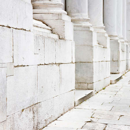 Base of the marble columns of a romanesque Italian churchの写真素材