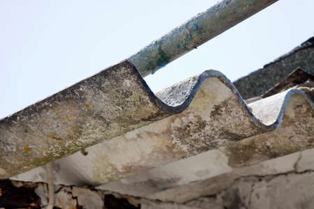 Dangerous asbestos roof - Medical studies have shown that the asbestos particles can cause cancerの写真素材