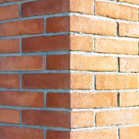 Corner of a new brick wallの写真素材