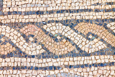 Italian roman mosaic with circular graphic (Italy)の写真素材