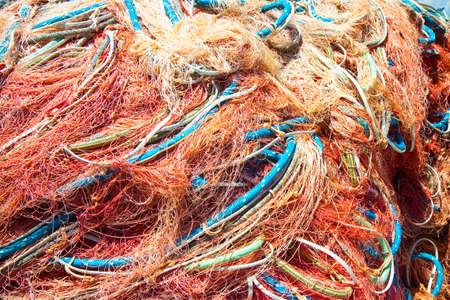 Fishing net in full colored backgroundの写真素材