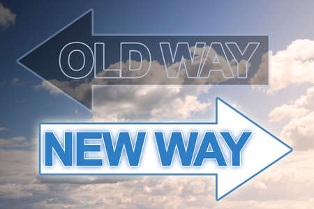 Old way and New way written against a cloudy skyの写真素材