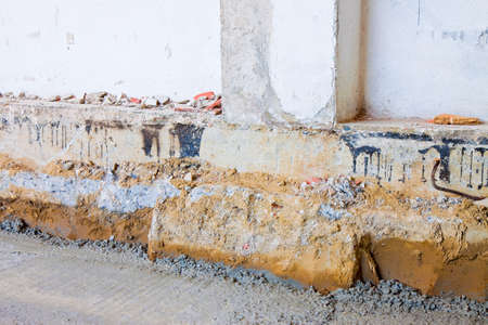 Preparatory stage for the construction of a ventilated crawl space in an old brick building