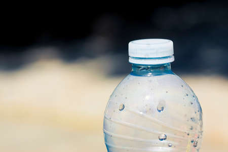 Platic water bottle with plastic - image with copy space