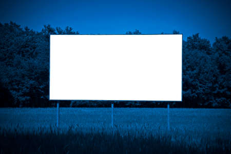 Blank advertising billboard immersed in a rural scene - image with copy space