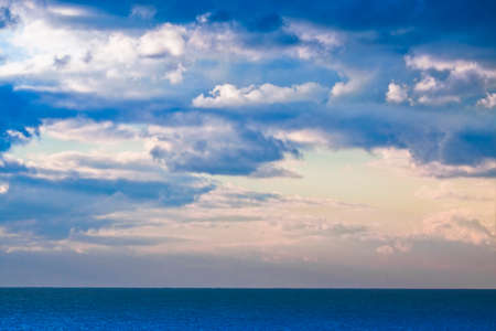 Calm sea with cloudy sky in the background - concept image with copy spaceの写真素材