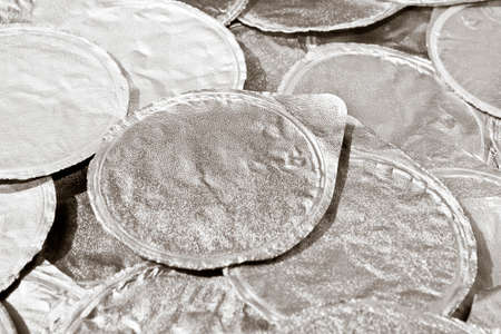 aluminum cover for yoghurt overlapped to each otherの写真素材