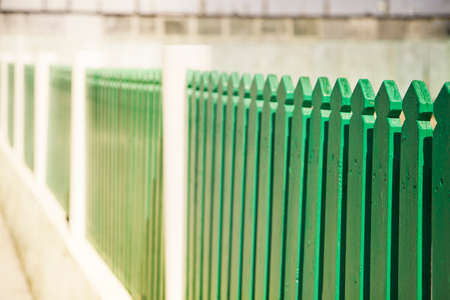 Green wooden fence - image with copyspaceの写真素材