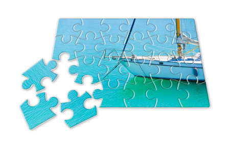 Learning to ride on a sailboat step by step - concept image in puzzle shapeの写真素材