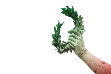 Hand holds a laurel wreath - bronze statue on italian flag background - Success and fame concept image - image with copy spaceの写真素材