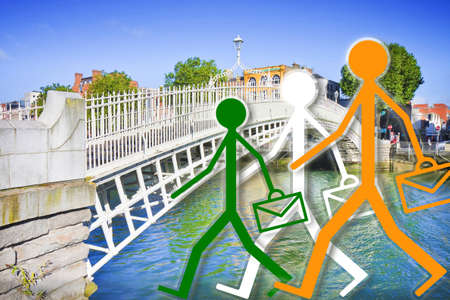 Coming to work in Ireland - concept image with the famous Half penny bridge in Dublin and employees...