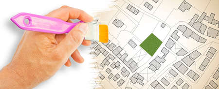 Imaginary cadastral map of territory with a free green land available for building construction -...