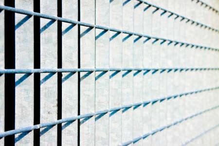 Closed metal grate with copy spaceの写真素材