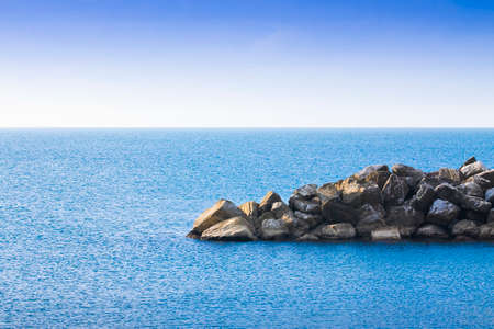 Calm sea with clear sky in background - concept image with copy spaceの写真素材