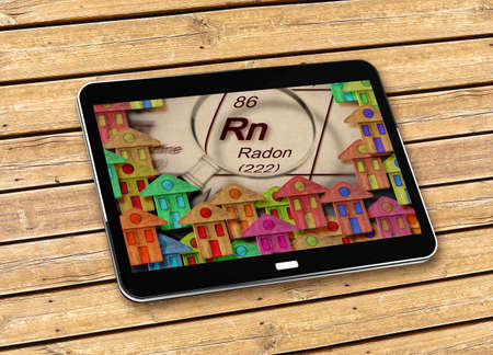 The danger of radon gas in our homes  - concept image - concept image with 3D render of a digital tablet.の写真素材