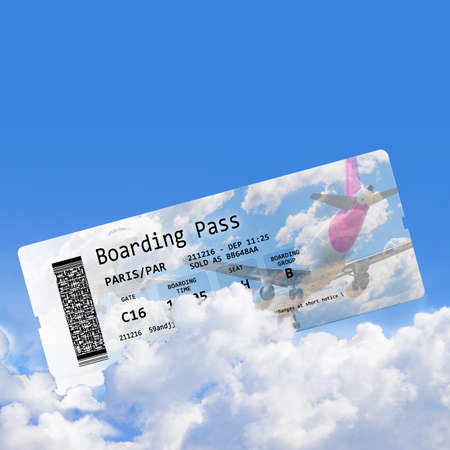 Airline boarding pass tickets isolated on cloudy sky - the contents of the image are totally...