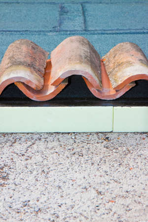 Roof thermal insulation with polystyrene panels covered with waterproof membrane and italian...