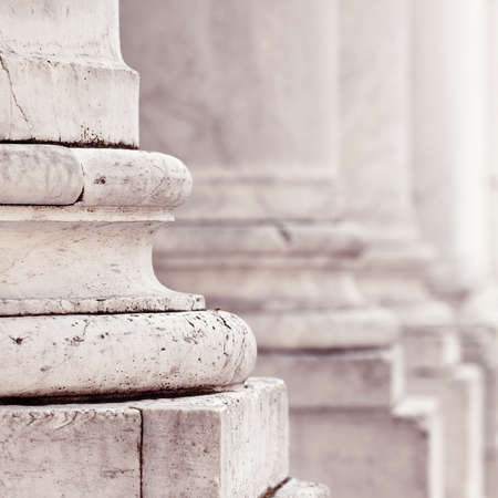 Base of the marble columns of a romanesque medieval Italian church.の写真素材