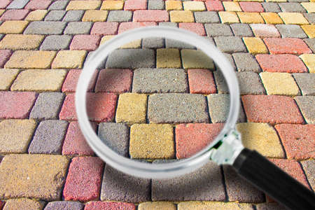 Colored concrete flooring block assembled on a substrate of sand - type of flooring permeable to...