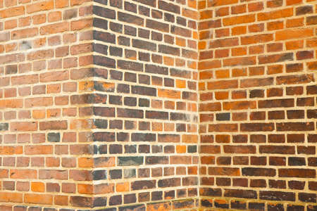 Old corner of Danish brick walls without plaster.