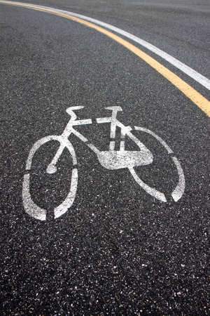 Bicycle Lane - bicycle silhouette drawn on the asphaltの写真素材
