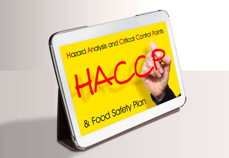 HACCP (Hazard Analyzes and Critical Control Points) - Food Safety and Quality Control in food industry concept image wit digital tablet.の写真素材