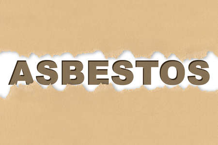Asbestos infographic concept with text behind a torn cardboard backgroundの写真素材