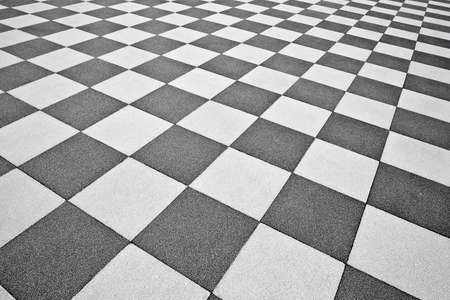 Detail of the pavement of the famous Mascagni square in Livorno with the particular chessboard design (Tuscan-Italy).の写真素材
