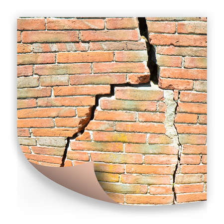 Deep crack in old brick wall - concept image