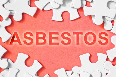 Asbestos text - Problems, strategy and solution concept in jigsaw puzzle shapeの写真素材