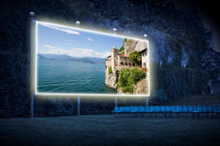 Ancient hermitage and monastery of Santa Caterina - Saint Catherine - on the cliffs of Lake Maggiore (Italy - Switzerland - Europe) - Outdoor cinema concept imageの写真素材