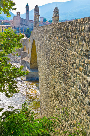 Bobbio city with the ancient medieval called Old Bridge or hunchback bridge, in italian Ponte Gobbo, over the Trebbia river - Europe-Italy-Piacenza cityの写真素材
