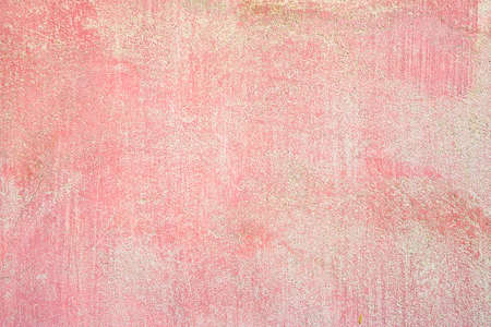 Old rough plaster background with red color washed away by the rainの写真素材