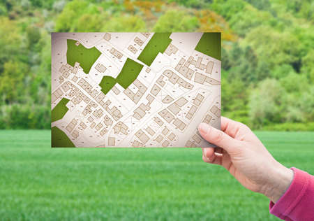 Land plot management - real estate concept with a vacant land on a green residential area available...
